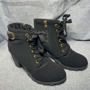 Elegant Black Ankle Boots with Gold Accents